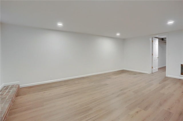 129 S Dr, Fox Chapel, PA 15238 - finished below grade area with light wood-type flooring, recessed lighting, and baseboards