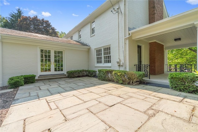 129 S Dr, Fox Chapel, PA 15238 - covered porch featuring french doors and a patio area
