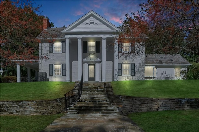 129 S Dr, Fox Chapel, PA 15238 - neoclassical home featuring a front yard and a chimney