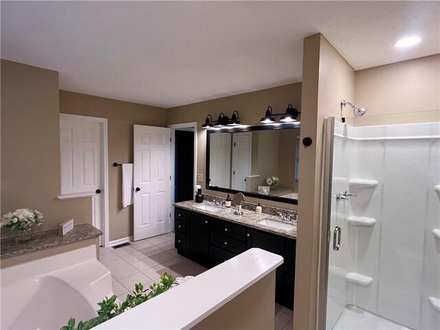 138 Willow Run Dr, Center Twp But, PA 16001 - full bathroom with a stall shower, double vanity, tile patterned flooring, and a garden tub