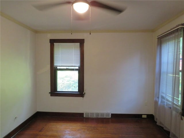 1111 Progress St, Mckees Rocks, PA 15136 - spare room featuring ornamental molding, dark wood finished floors, ceiling fan, and baseboards