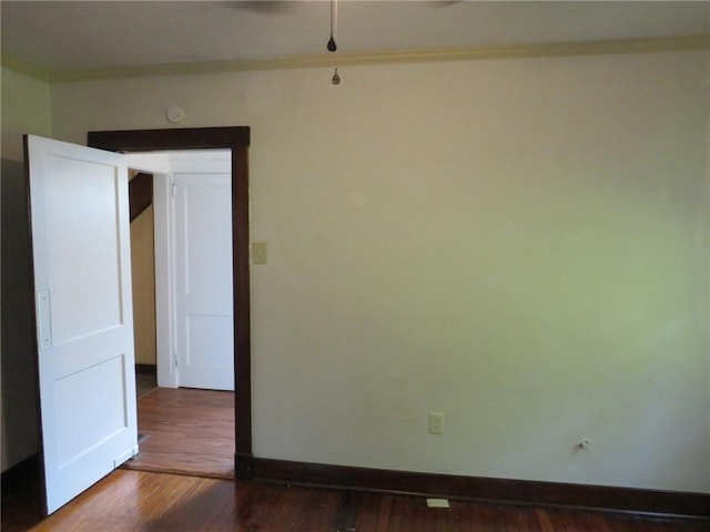 1111 Progress St, Mckees Rocks, PA 15136 - spare room featuring crown molding, wood finished floors, and baseboards