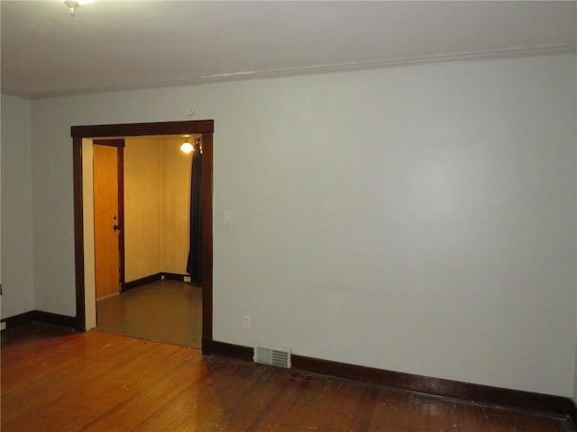 1111 Progress St, Mckees Rocks, PA 15136 - spare room with wood finished floors and baseboards