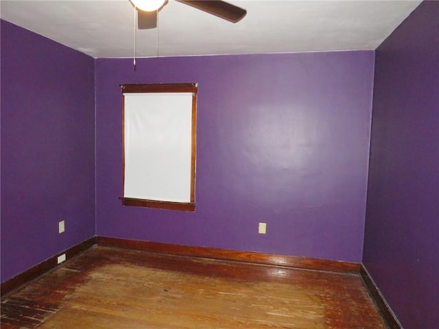 1111 Progress St, Mckees Rocks, PA 15136 - empty room featuring wood finished floors, ceiling fan, and baseboards