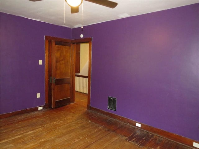 1111 Progress St, Mckees Rocks, PA 15136 - unfurnished room featuring ceiling fan, hardwood / wood-style flooring, and baseboards