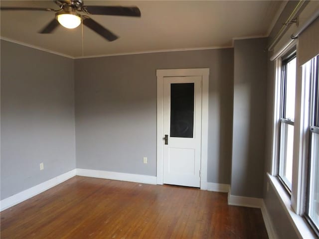 1111 Progress St, Mckees Rocks, PA 15136 - spare room with hardwood / wood-style floors, baseboards, ornamental molding, and a ceiling fan