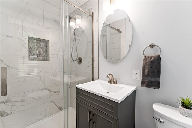227 Shady Knoll Dr, Scott Twp Sal, PA 15220 - bathroom featuring toilet, vanity, and a shower with shower door