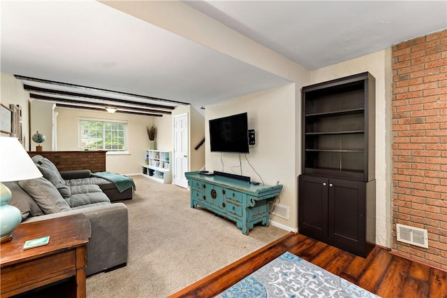 227 Shady Knoll Dr, Scott Twp Sal, PA 15220 - living area with dark wood-type flooring, brick wall, and baseboards