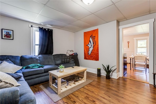 149-151 French St, Hempfield Twp Wml, PA 15601 - living room featuring wood finished floors and a drop ceiling