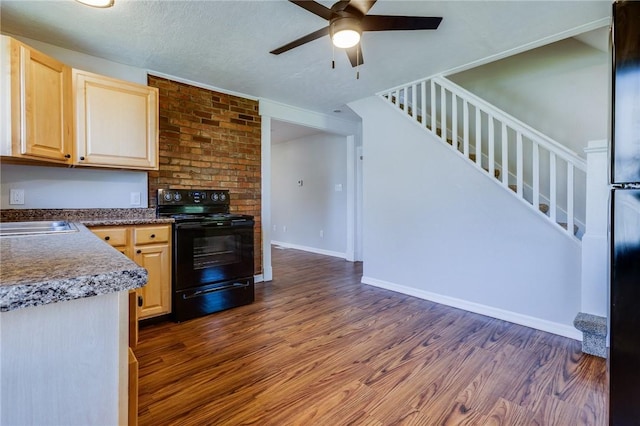 149-151 French St, Hempfield Twp Wml, PA 15601 - kitchen featuring electric range, light brown cabinetry, dark wood-type flooring, a ceiling fan, and a sink