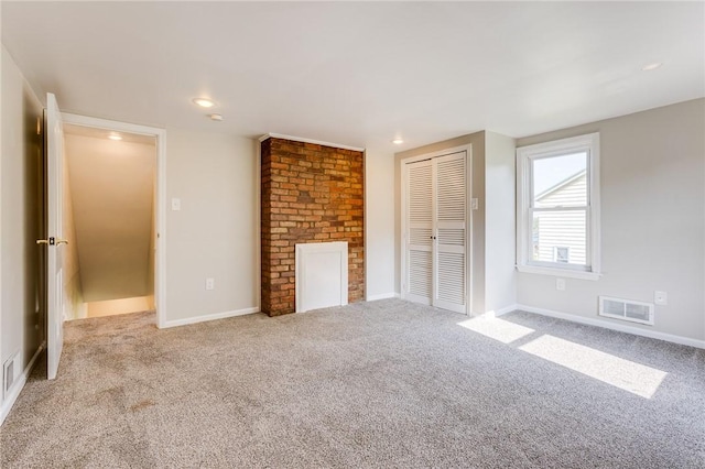 149-151 French St, Hempfield Twp Wml, PA 15601 - unfurnished living room featuring carpet and baseboards