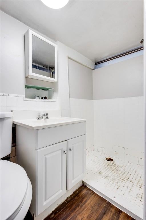 149-151 French St, Hempfield Twp Wml, PA 15601 - bathroom featuring toilet, wood finished floors, and vanity