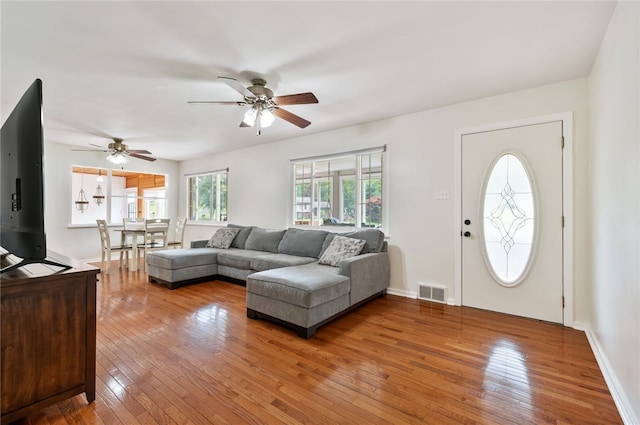 3702 School Rd, Murrysville, PA 15668 - living room featuring light wood finished floors, a ceiling fan, and baseboards