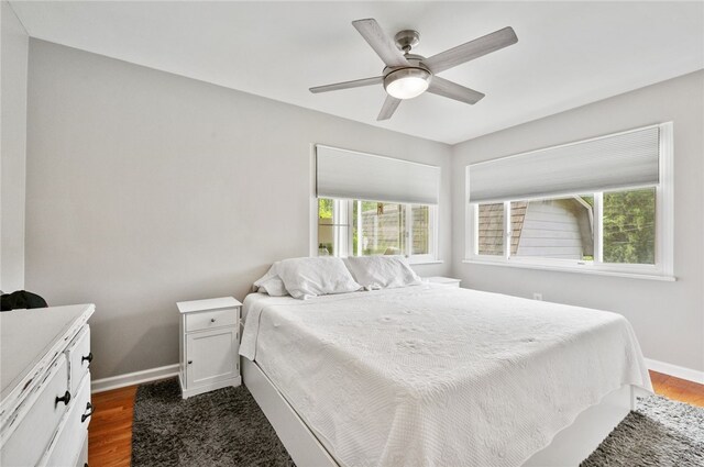 3702 School Rd, Murrysville, PA 15668 - bedroom with baseboards, dark wood-style flooring, and a ceiling fan