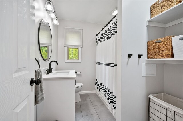 3702 School Rd, Murrysville, PA 15668 - full bath with toilet, a shower with curtain, baseboards, tile patterned floors, and vanity