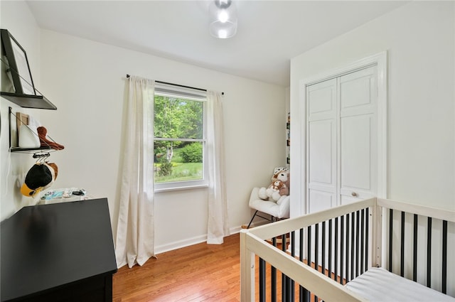 3702 School Rd, Murrysville, PA 15668 - bedroom featuring light wood finished floors, baseboards, and a closet
