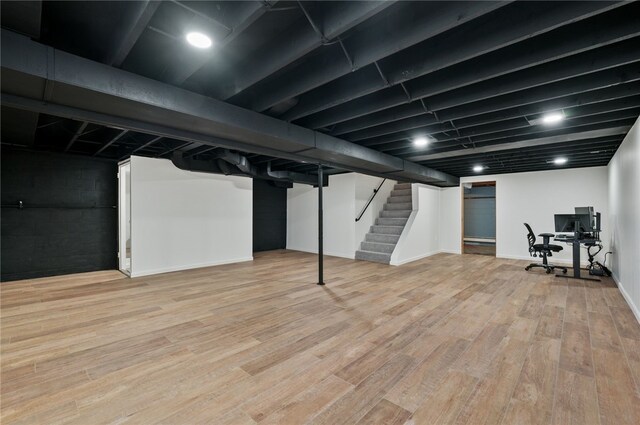 3702 School Rd, Murrysville, PA 15668 - finished below grade area featuring stairs, wood finished floors, baseboards, and an office area