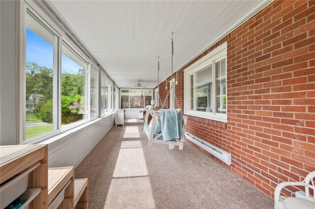 3702 School Rd, Murrysville, PA 15668 - unfurnished sunroom with a baseboard heating unit