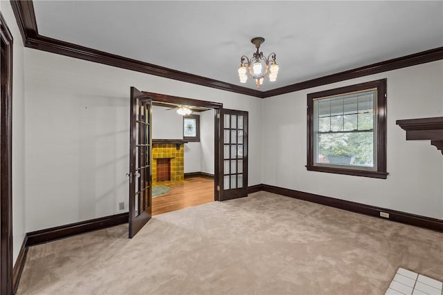 1623 Villanova, Morningside, PA 15206 - carpeted spare room with ornamental molding, french doors, healthy amount of natural light, baseboards, and a chandelier