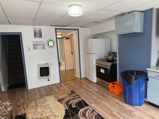 1704 High St, Spring Garden, PA 15212 - kitchen featuring heating unit, electric stove, a drop ceiling, wood finished floors, and freestanding refrigerator