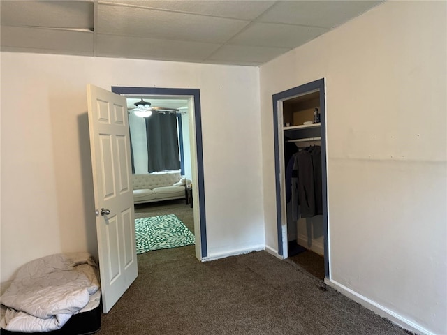 1704 High St, Spring Garden, PA 15212 - unfurnished bedroom featuring dark colored carpet, baseboards, and a closet