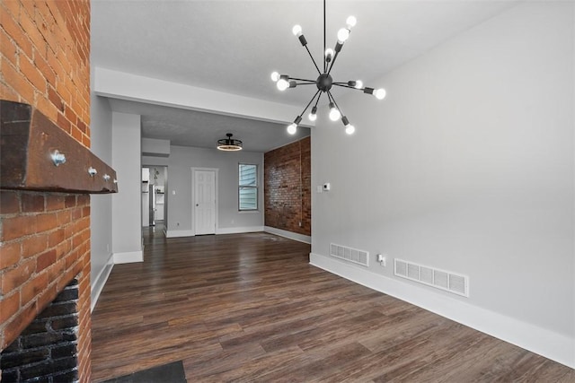 2532 Larkins Way S, Side, PA 15203 - unfurnished living room featuring a chandelier, dark wood finished floors, baseboards, and brick wall
