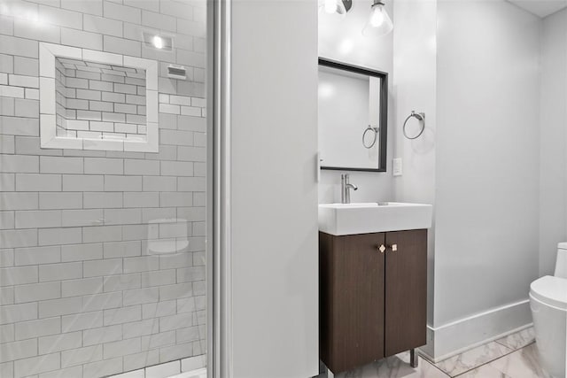 2532 Larkins Way S, Side, PA 15203 - bathroom featuring marble look tile flooring, toilet, vanity, a stall shower, and baseboards