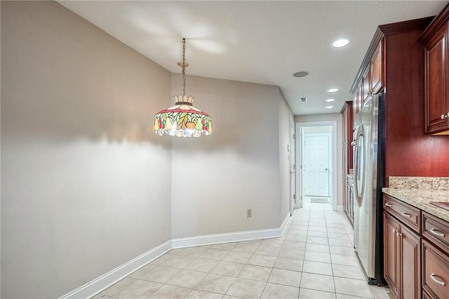 4115 Duckhorn Dr, Moon/Crescent Twp, PA 15108 - kitchen featuring freestanding refrigerator, baseboards, decorative light fixtures, recessed lighting, and light stone countertops