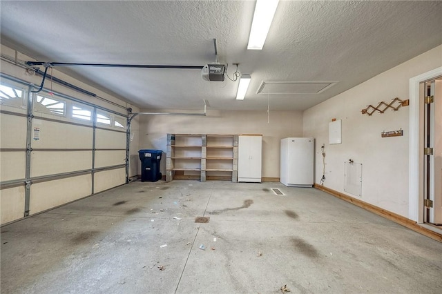 4115 Duckhorn Dr, Moon/Crescent Twp, PA 15108 - garage with a garage door opener and freestanding refrigerator