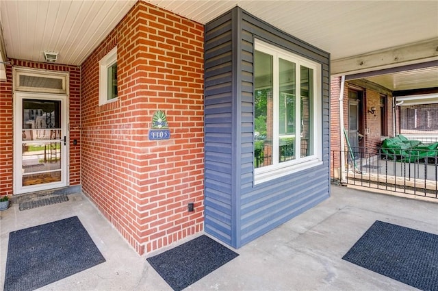 1105 Chislett St, Morningside, PA 15206 - doorway to property with a porch and brick siding