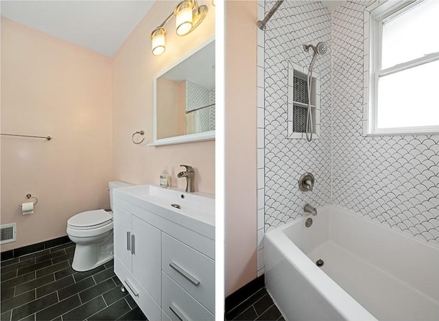1105 Chislett St, Morningside, PA 15206 - full bath with tile patterned floors, vanity, toilet, and bathtub / shower combination