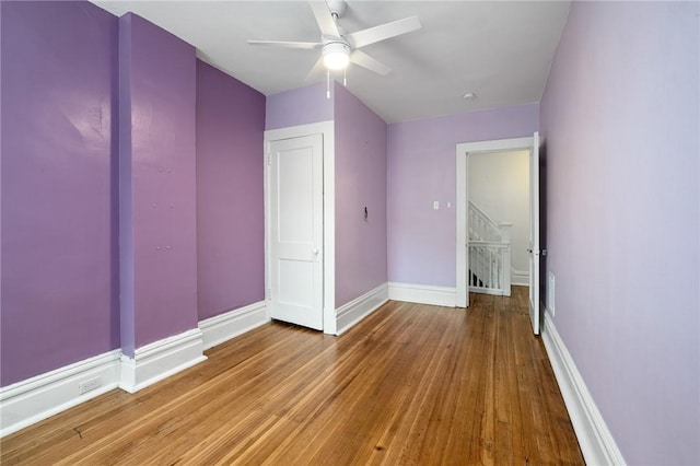 1105 Chislett St, Morningside, PA 15206 - unfurnished bedroom featuring baseboards, wood finished floors, and ceiling fan