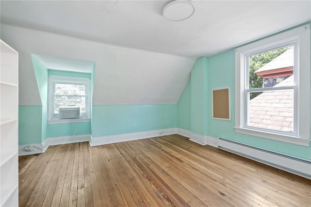 1105 Chislett St, Morningside, PA 15206 - bonus room with hardwood / wood-style floors, baseboard heating, vaulted ceiling, baseboards, and cooling unit