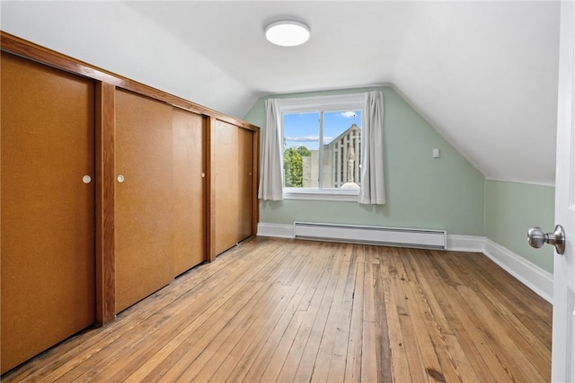 1105 Chislett St, Morningside, PA 15206 - bonus room with baseboard heating, light wood-style floors, baseboards, and vaulted ceiling