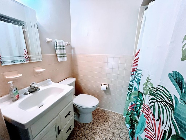 1720 Saltsburg Ave, White Twp Ind, PA 15701 - full bath with tile walls, vanity, toilet, a wainscoted wall, and a shower with shower curtain