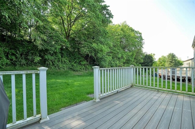 317 Fairview Dr, Manor, PA 15642 - wooden terrace featuring a lawn