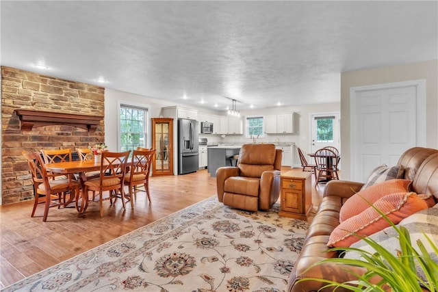 2246 Shannon Mills Dr, Connoquenessing Twp, PA 16053 - living area with healthy amount of natural light, light wood finished floors, and recessed lighting