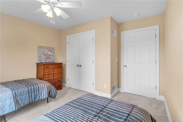 2246 Shannon Mills Dr, Connoquenessing Twp, PA 16053 - bedroom featuring light colored carpet, a closet, and baseboards