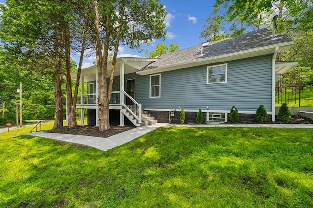 80 Butler St, Valencia Boro, PA 16059 - back of property featuring a lawn, covered porch, stairs, and roof with shingles