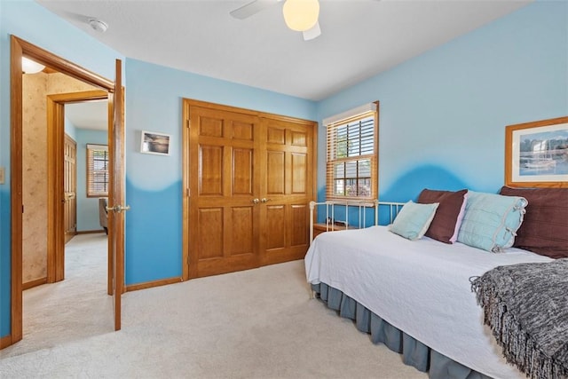 1616 Norman Dr, Franklin Park, PA 15143 - bedroom featuring light colored carpet, a ceiling fan, and a closet