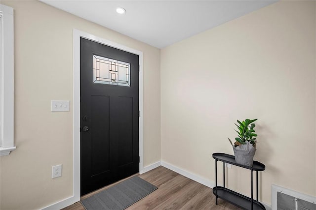 162 E Wedgewood Dr, Ross Twp, PA 15229 - entrance foyer featuring wood finished floors, baseboards, and recessed lighting