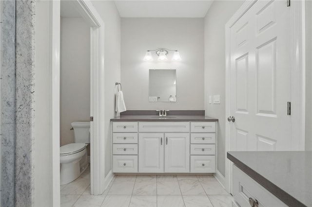 112 Savannah Dr, Lancaster Twp, PA 16037 - full bath with vanity, marble finish floors, toilet, and baseboards