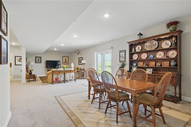 112 Savannah Dr, Lancaster Twp, PA 16037 - dining space featuring light carpet, recessed lighting, baseboards, and ornate columns