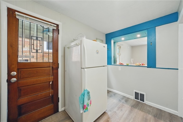 131 Spring Ave, Bellevue, PA 15202 - kitchen with freestanding refrigerator, wood finished floors, and baseboards