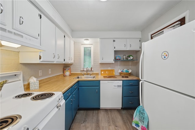 131 Spring Ave, Bellevue, PA 15202 - kitchen featuring white appliances, a sink, under cabinet range hood, blue cabinetry, and dark wood-style flooring