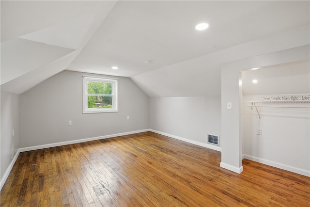 131 Spring Ave, Bellevue, PA 15202 - additional living space with hardwood / wood-style floors, baseboards, lofted ceiling, and recessed lighting