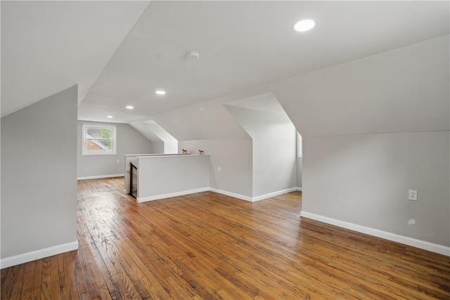 131 Spring Ave, Bellevue, PA 15202 - additional living space featuring vaulted ceiling, wood-type flooring, baseboards, and recessed lighting