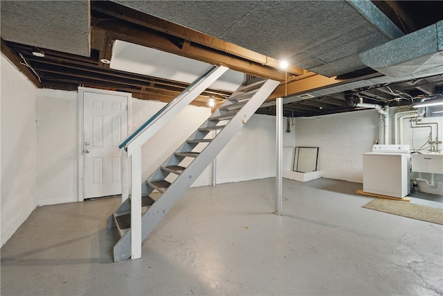 131 Spring Ave, Bellevue, PA 15202 - unfinished below grade area with washer / clothes dryer, stairway, and a sink