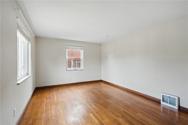 131 Spring Ave, Bellevue, PA 15202 - empty room featuring plenty of natural light, wood finished floors, and baseboards