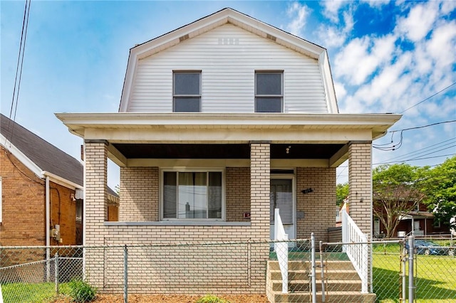 315 Wright St, Mckees Rocks, PA 15136 - colonial inspired home featuring a gambrel roof, brick siding, and covered porch